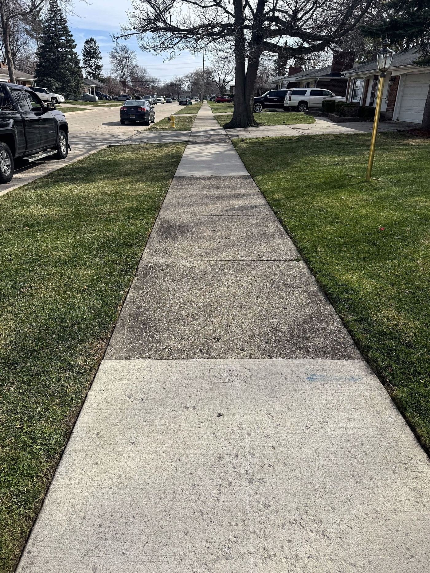 Clean Cutz Lawn Service crew at work in St. Clair Shores